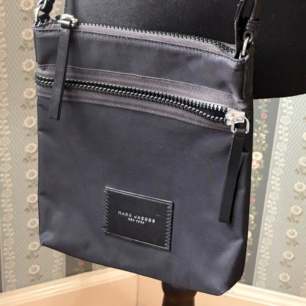 Sleek Minimalist Marc Jacobs Black Crossbody Bag with Silver Hardware